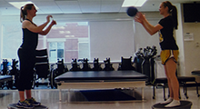 Students in a PT clinic throwing a ball to each other