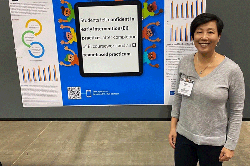 a woman standing in front of a poster of a scientific study