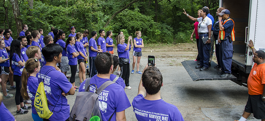 Community service day students gathered outside
